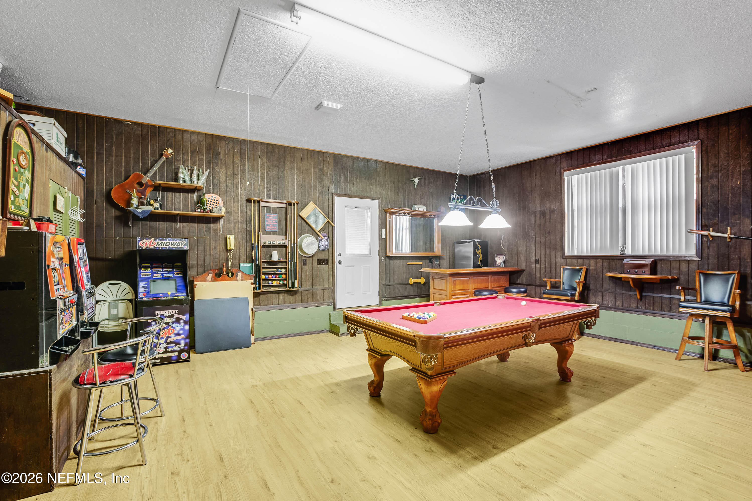 289 Chesser Road Interlachen, FL 32148 - Photo 5 of 63 a room with furniture pool table and flat screen tv