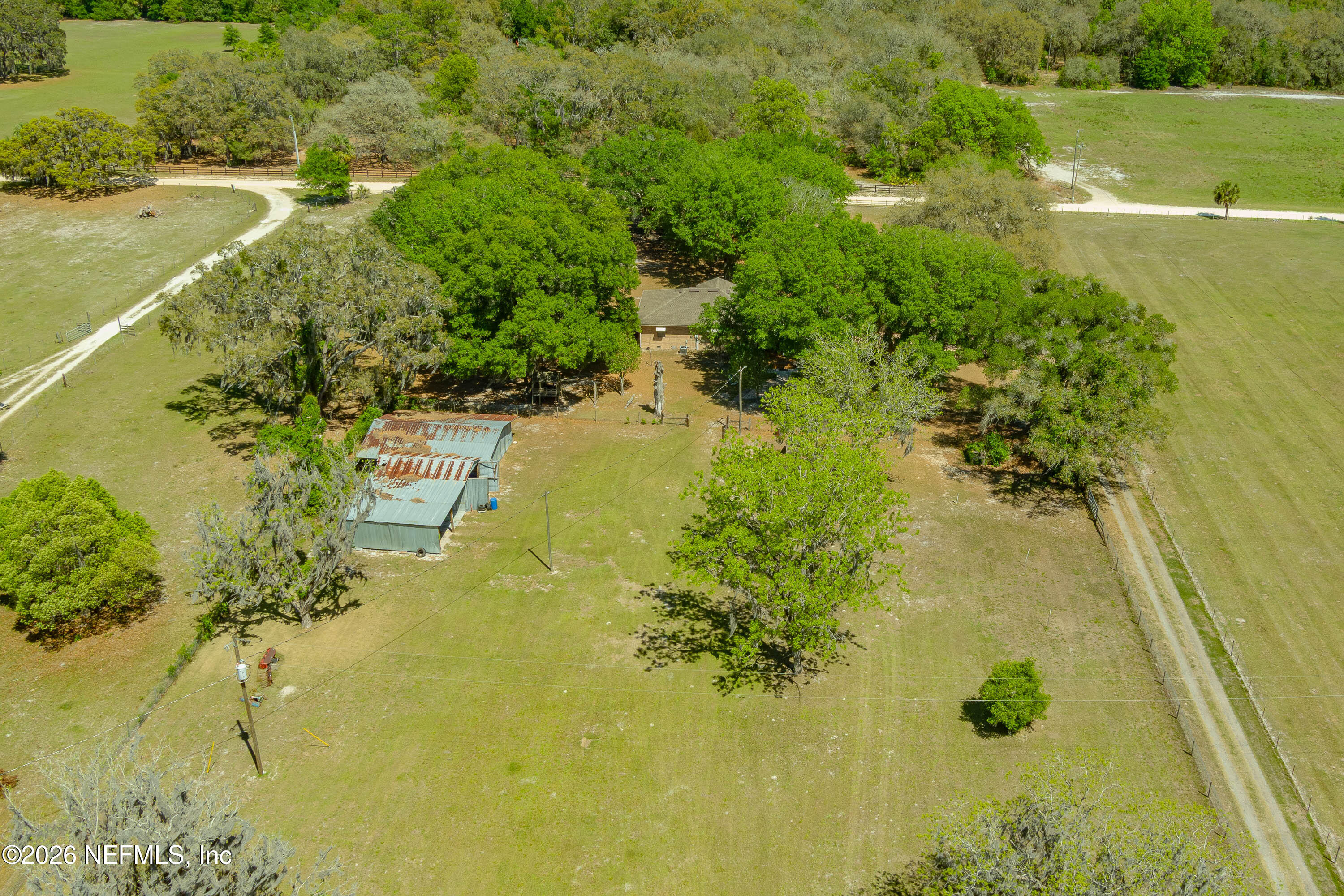 289 Chesser Road Interlachen, FL 32148 - Photo 55 of 63 a view of a lake with a yard