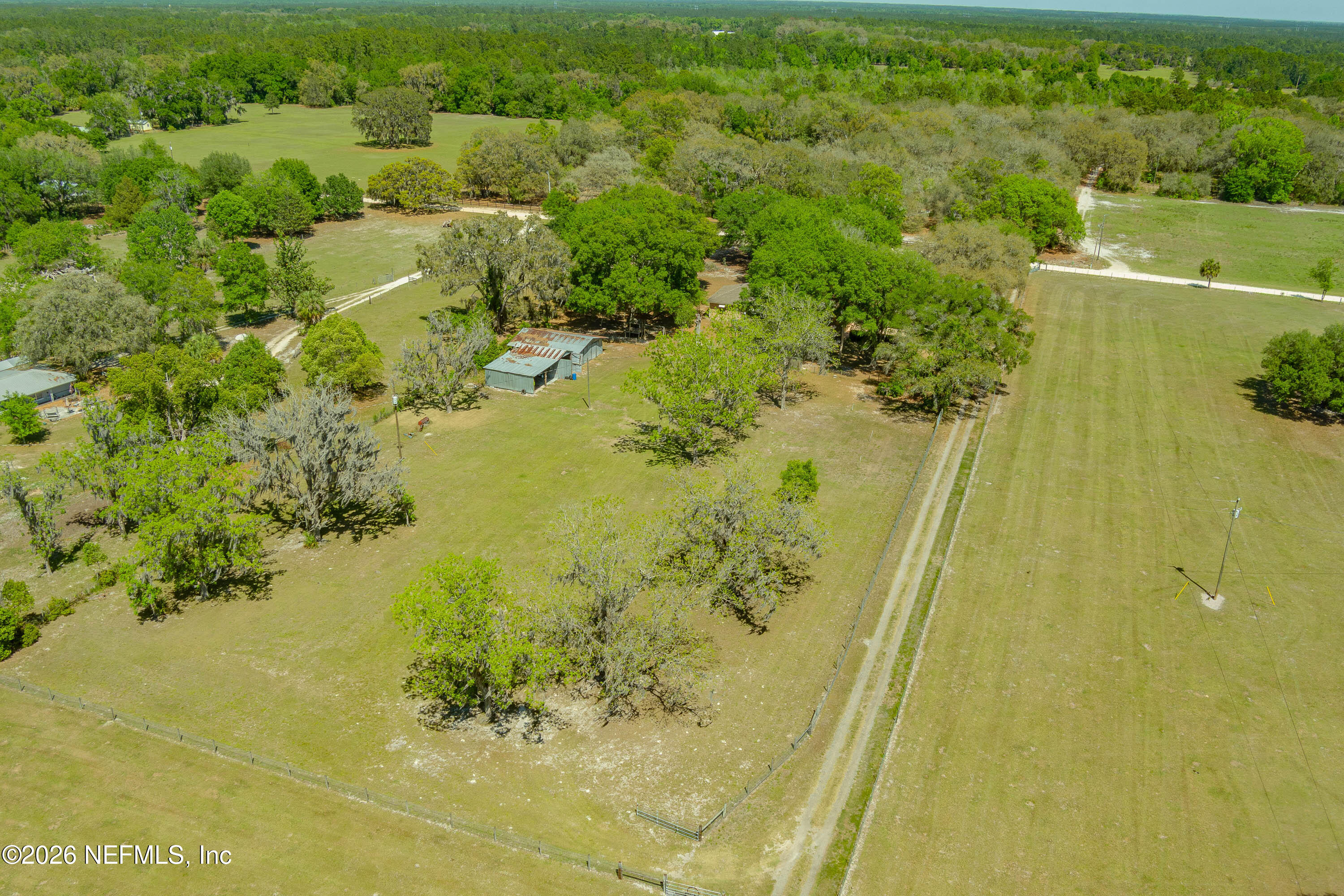 289 Chesser Road Interlachen, FL 32148 - Photo 56 of 63 a view of a lake with a mountain