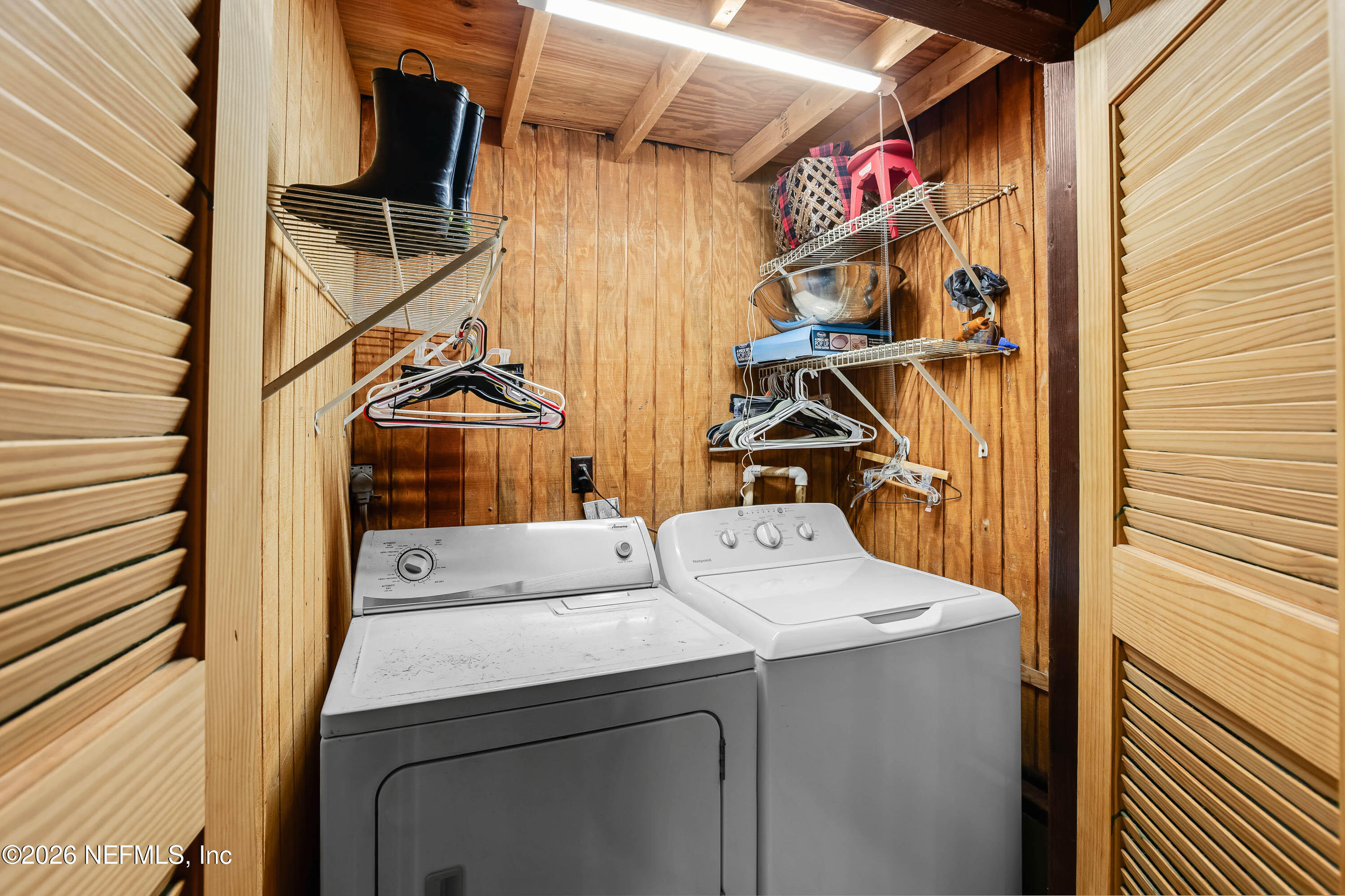 289 Chesser Road Interlachen, FL 32148 - Photo 62 of 63 a utility room with dryer and washer