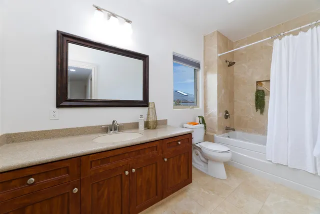 a bed room with a bed and a view of bedroom