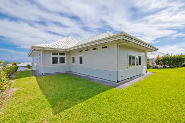 a view of a chairs and table in a patio