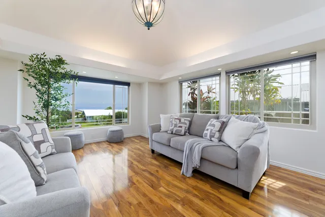 a large kitchen with kitchen island a sink counter top space and stainless steel appliances