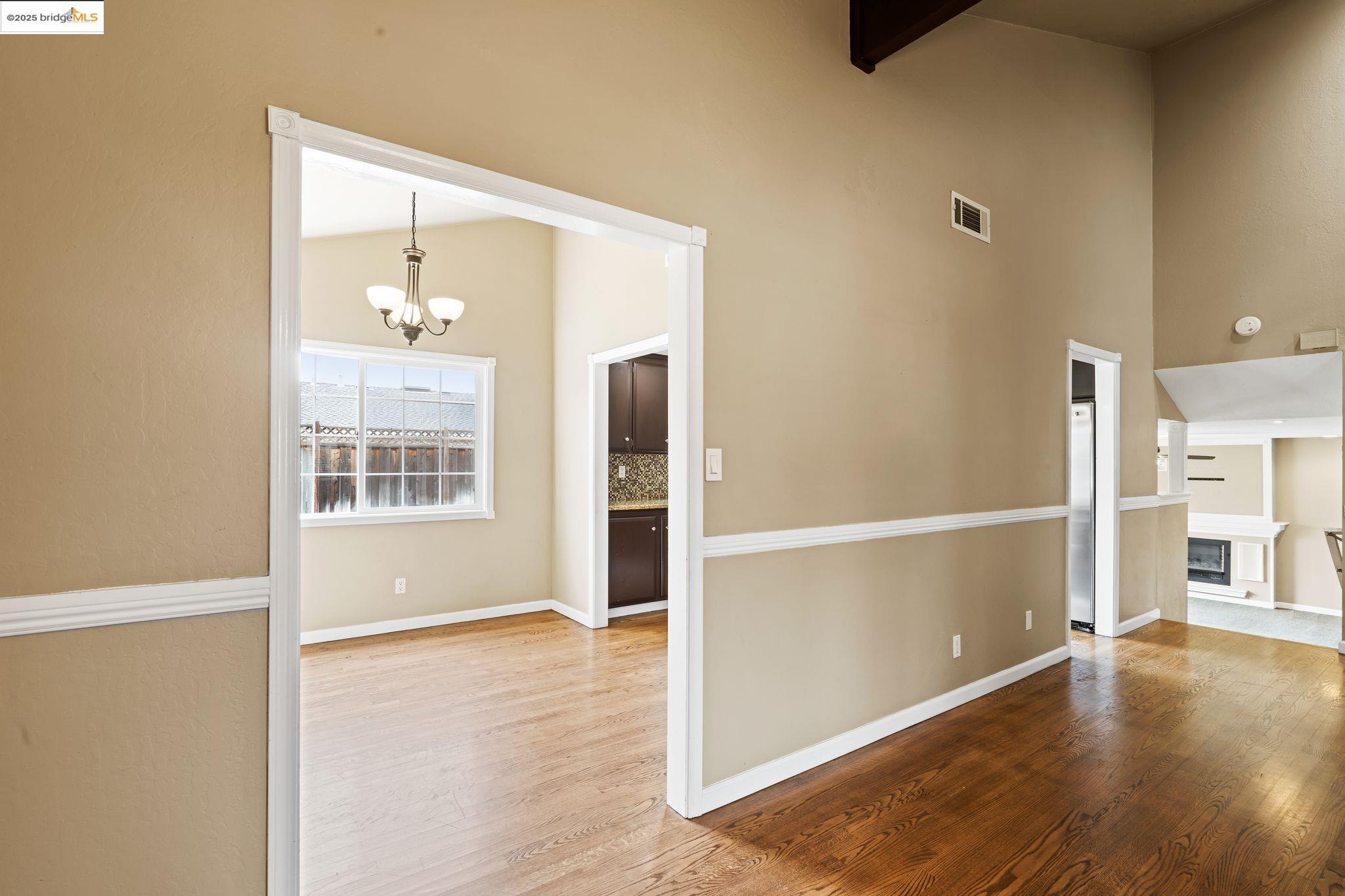 838 Hazel Street Livermore, CA 94550 - Photo 14 of 35 wooden floor in an empty room