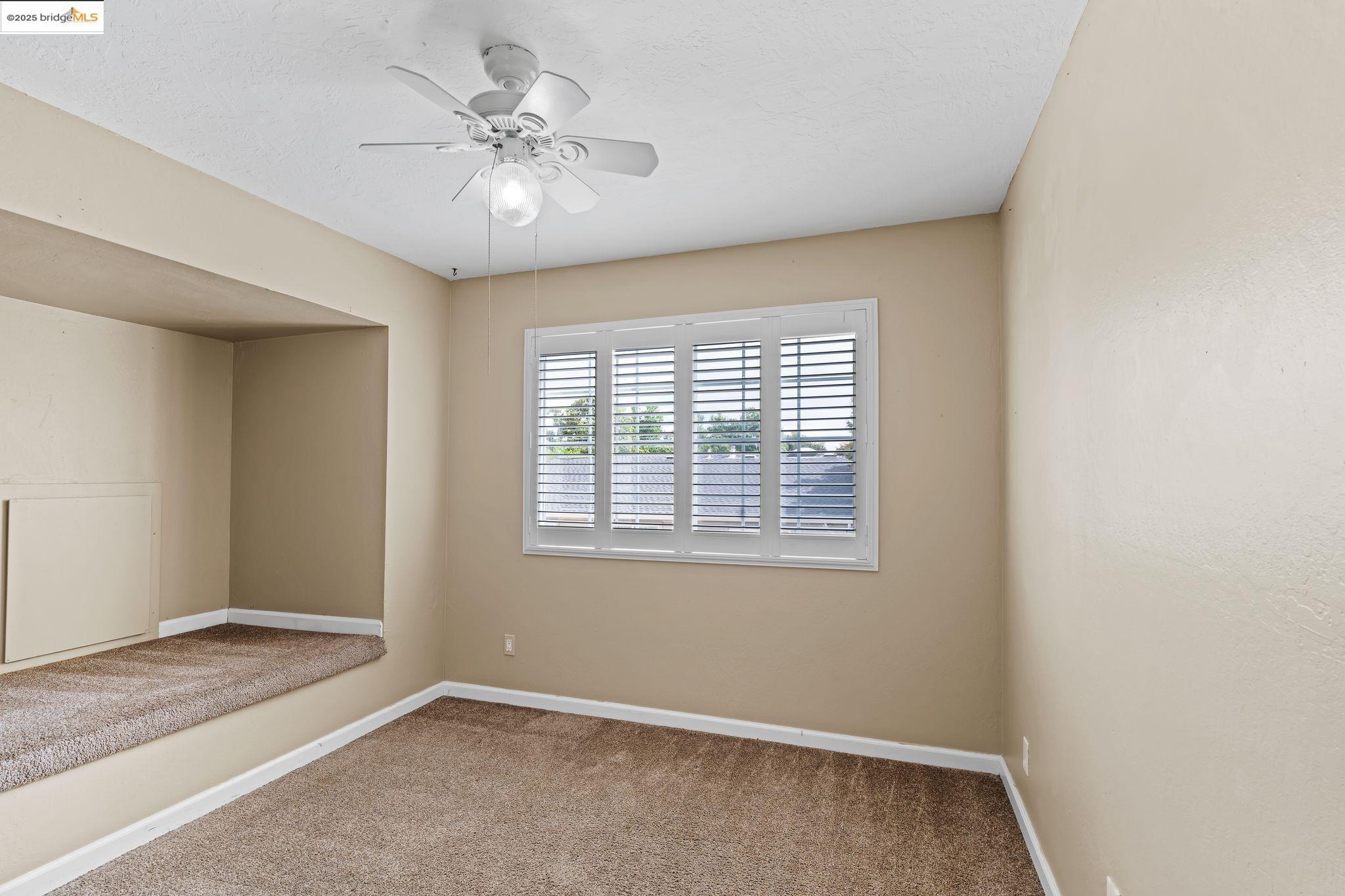 838 Hazel Street Livermore, CA 94550 - Photo 26 of 35 a view of an empty room with a window