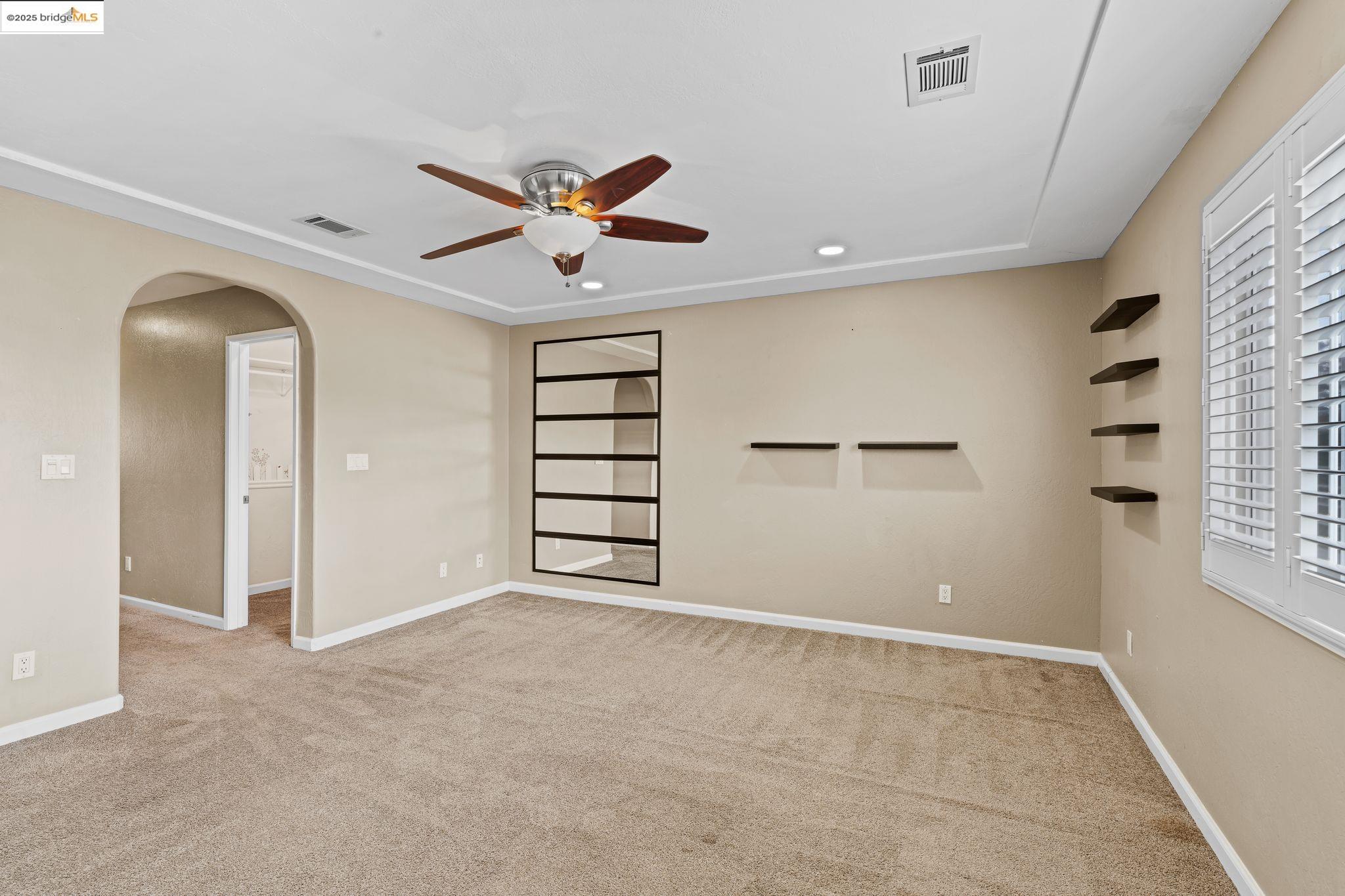 838 Hazel Street Livermore, CA 94550 - Photo 31 of 35 wooden floor in an empty room with a window