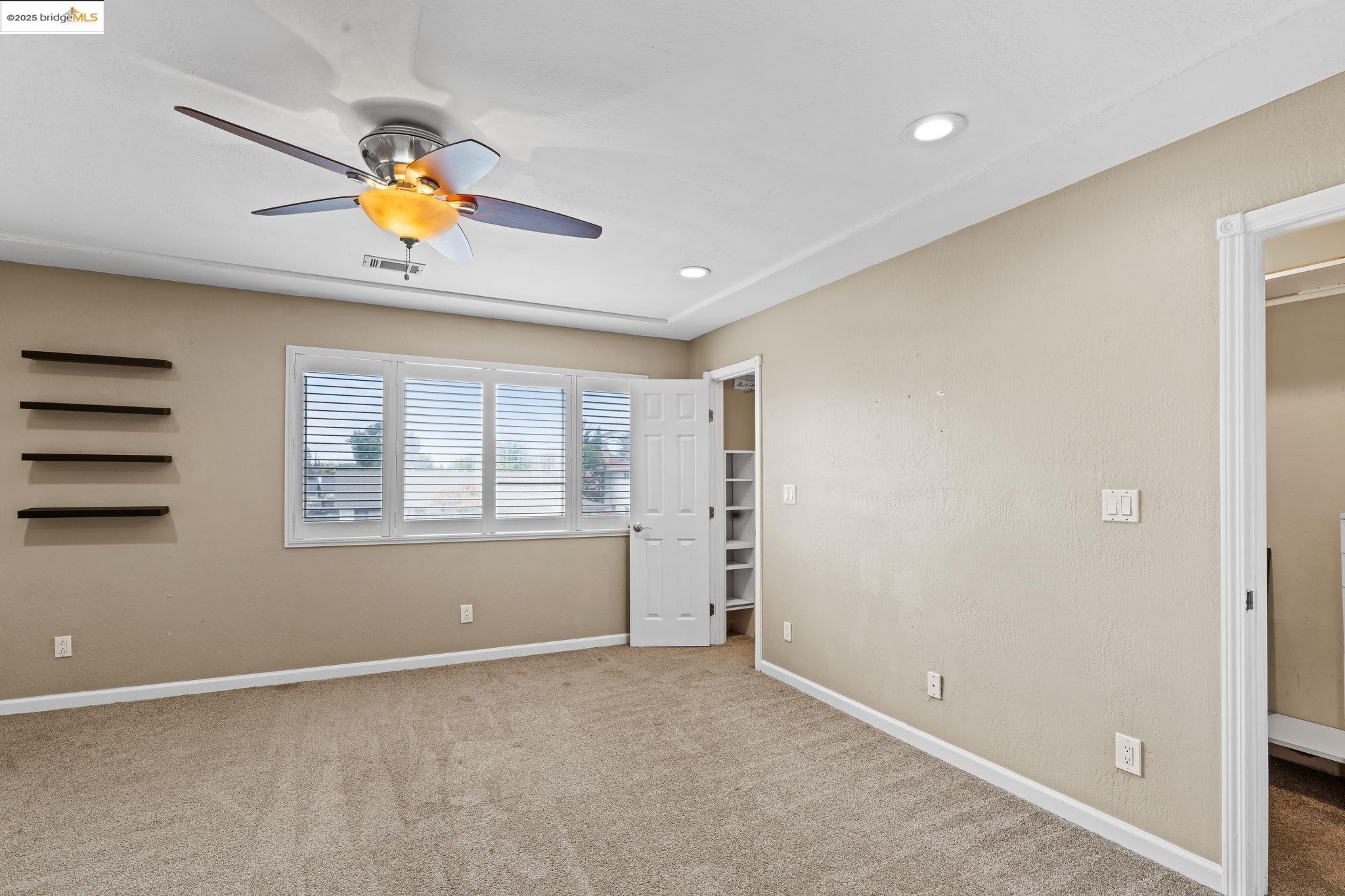 838 Hazel Street Livermore, CA 94550 - Photo 32 of 35 an empty room with a window and flowerpot