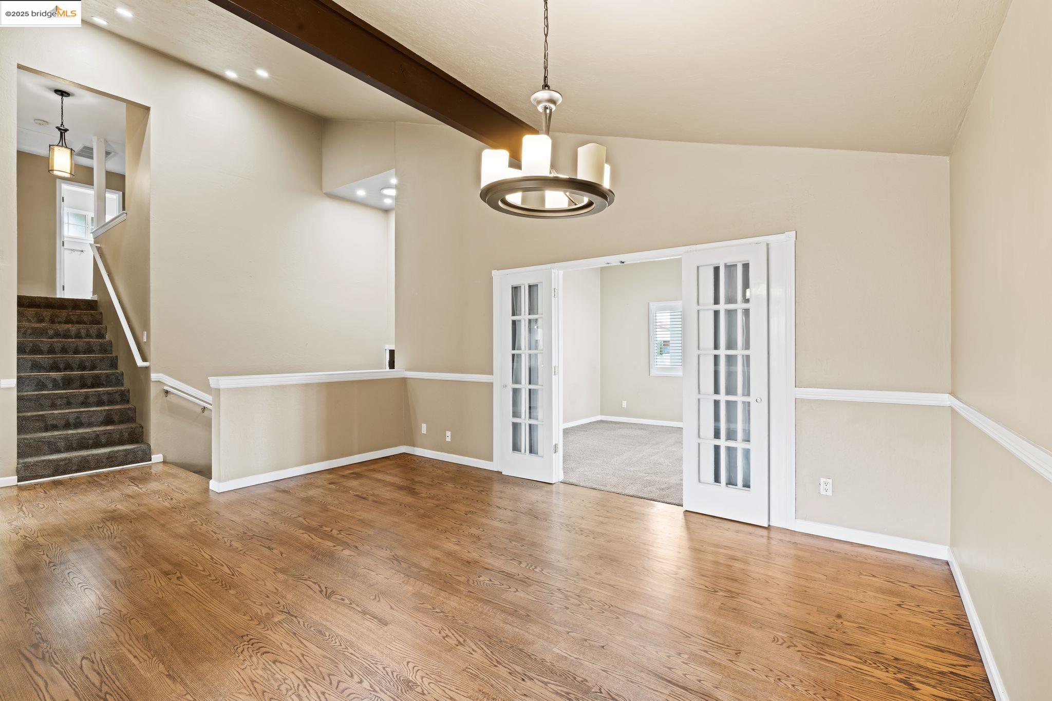 838 Hazel Street Livermore, CA 94550 - Photo 8 of 35 a view of an empty room with wooden floor