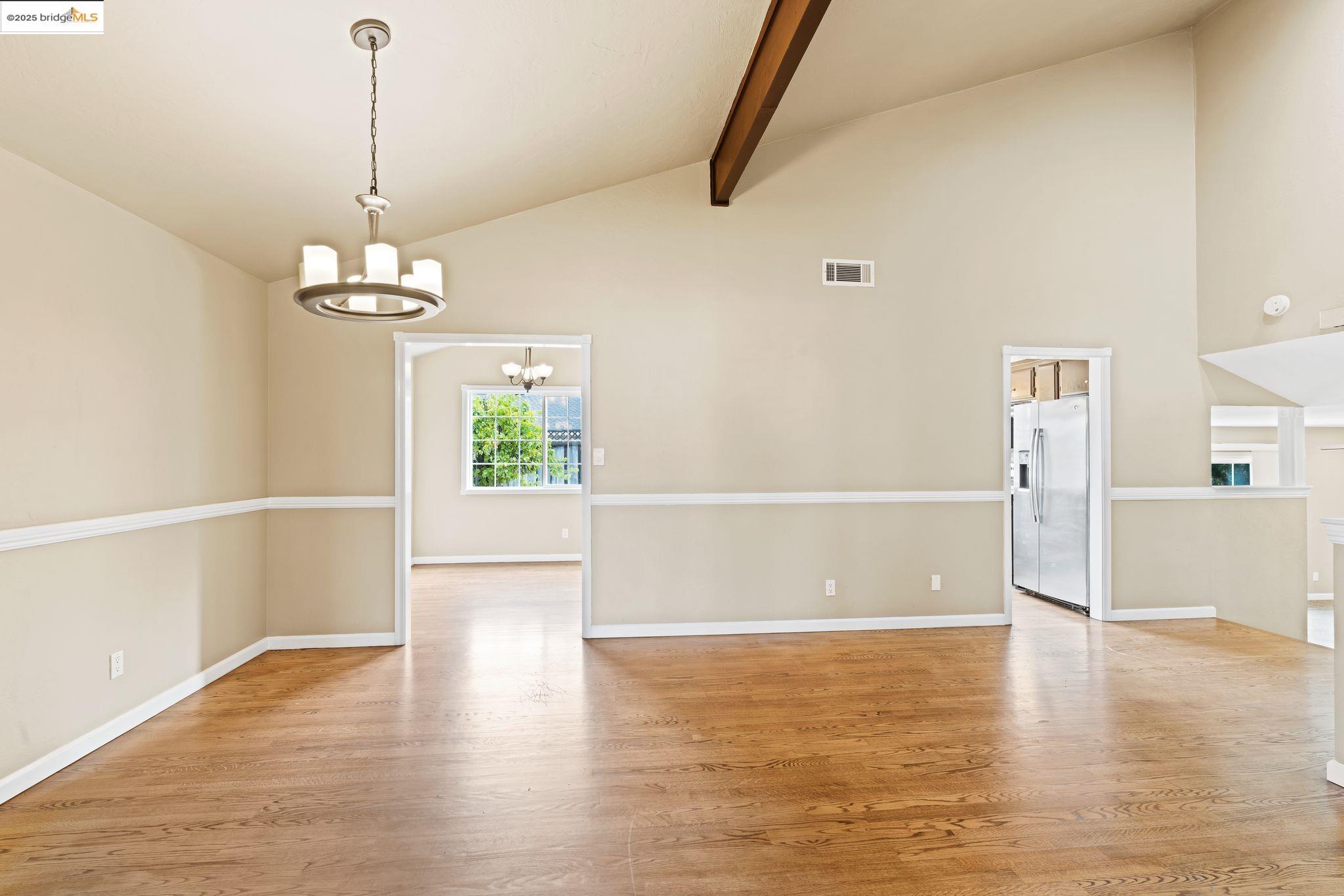 838 Hazel Street Livermore, CA 94550 - Photo 9 of 35 wooden floor in an empty room with a window