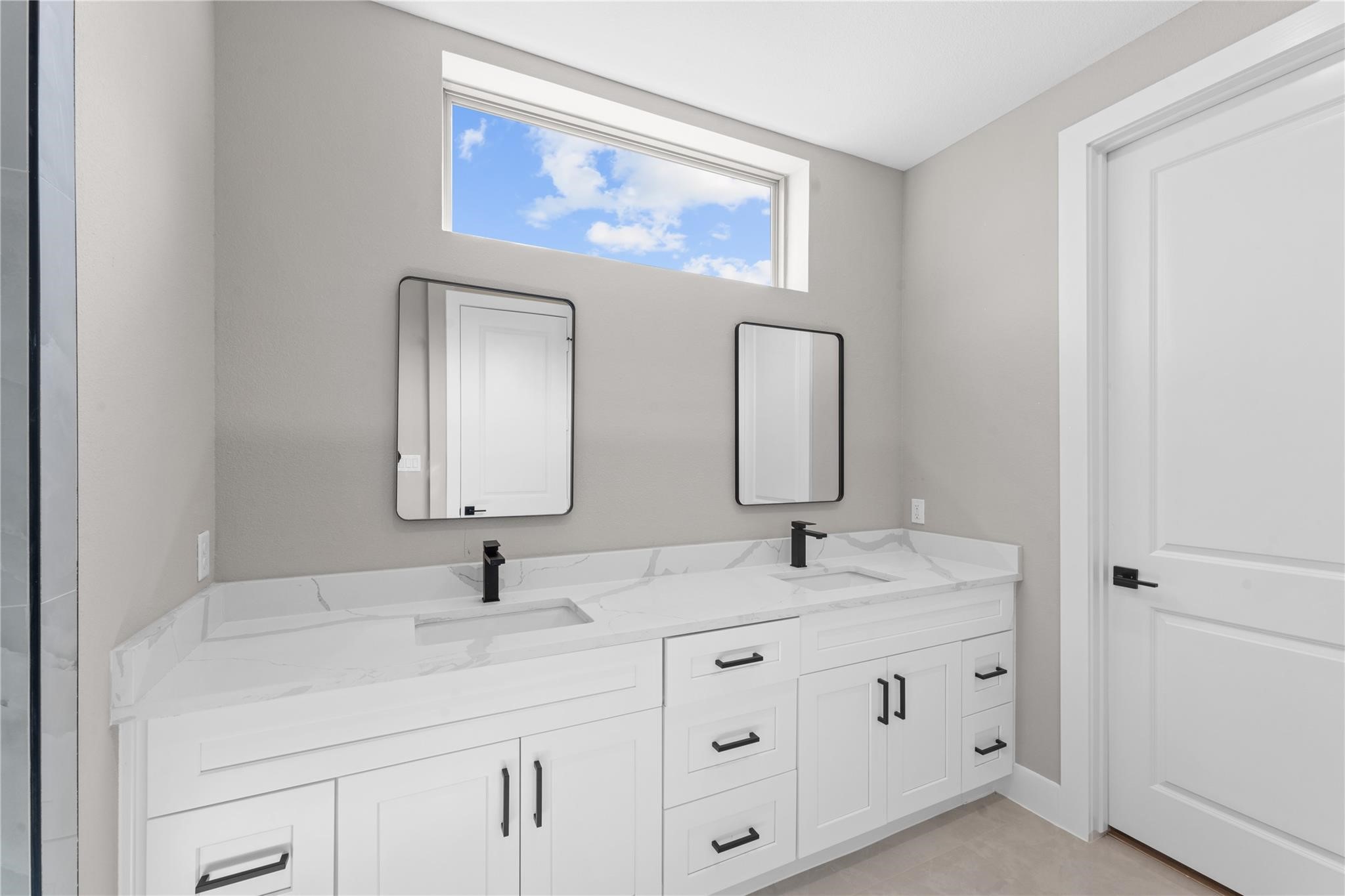 2515 Liguria Spring Spring, TX 77388 - Photo 13 of 17 a bathroom with double sink and a mirror