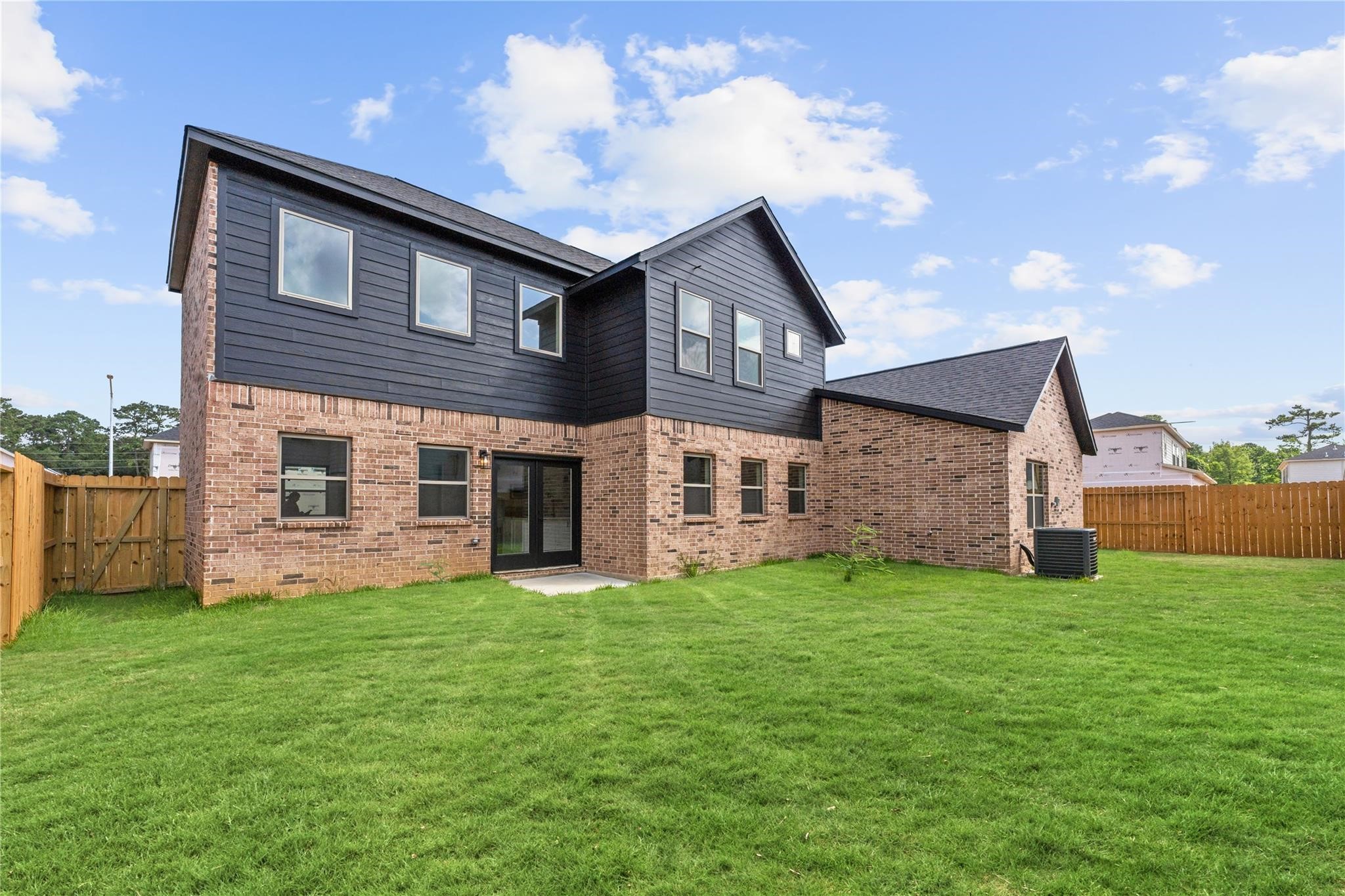 2515 Liguria Spring Spring, TX 77388 - Photo 17 of 17 a front view of a house with a yard and garage