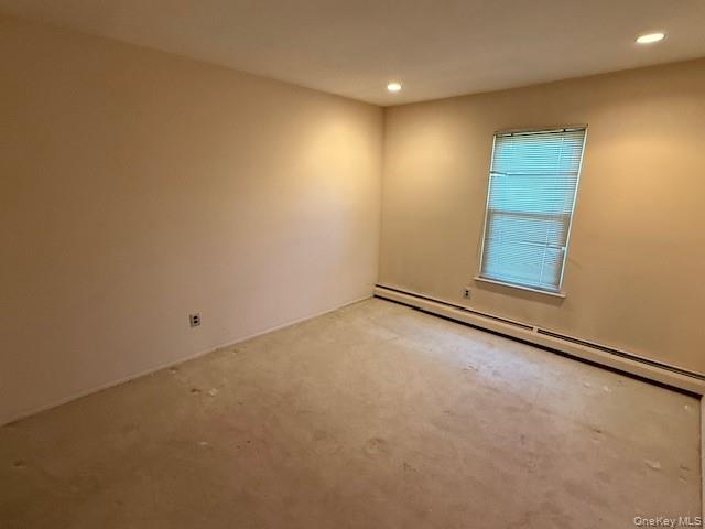 19 Carriage Road Roslyn, NY 11576 - Photo 12 of 19 an empty room with a empty space and window