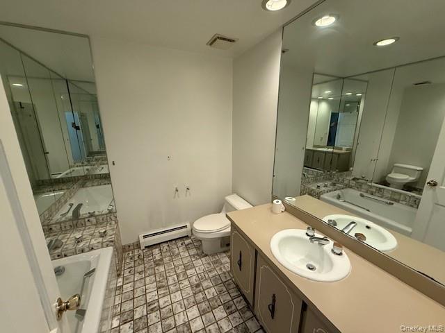 19 Carriage Road Roslyn, NY 11576 - Photo 13 of 19 a bathroom with a sink toilet and shower