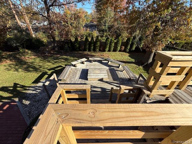 19 Carriage Road Roslyn, NY 11576 - Photo 15 of 19 a view of a roof deck with two couches and wooden floor