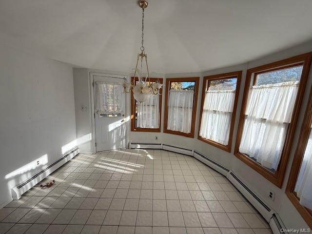 19 Carriage Road Roslyn, NY 11576 - Photo 7 of 19 a view of an empty room with glass door