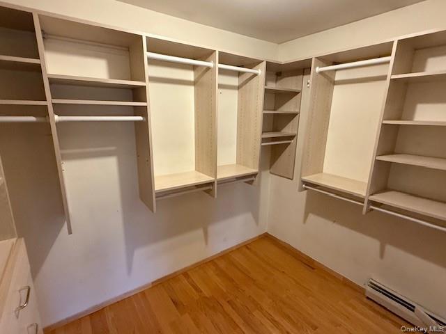 19 Carriage Road Roslyn, NY 11576 - Photo 9 of 19 a view of walk in closet with empty racks