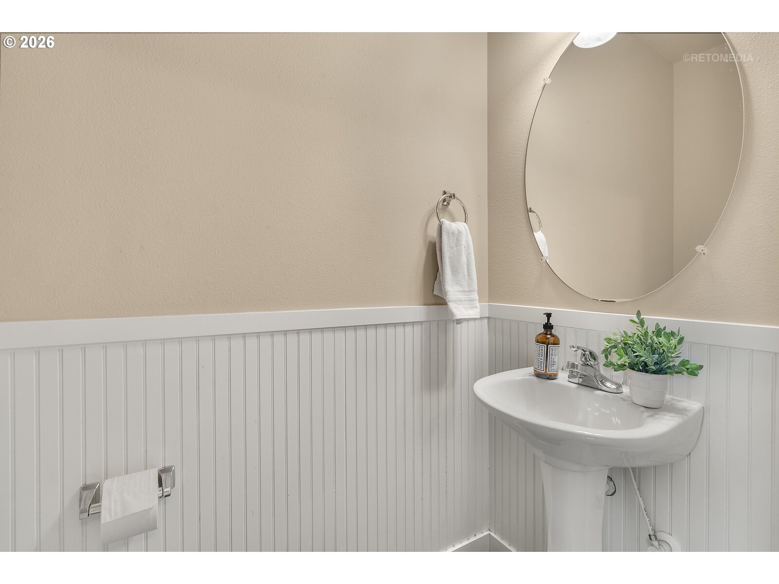 10442 Southwest Akilean Terrace Portland, OR 97223 - Photo 17 of 33 a bathroom with a sink vanity and a mirror