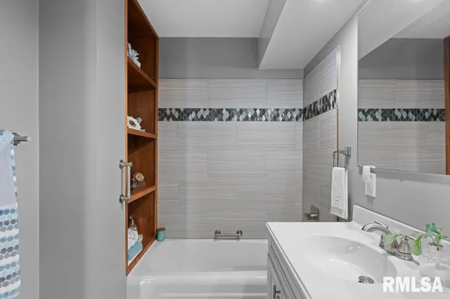 a bathroom with a sink and a tub