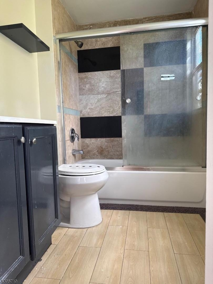 355 Metlars Lane Piscataway, NJ 08854 - Photo 16 of 26 a bathroom with a bathtub and a shower