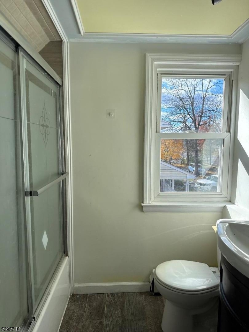 355 Metlars Lane Piscataway, NJ 08854 - Photo 21 of 26 a bathroom with a toilet and a shower