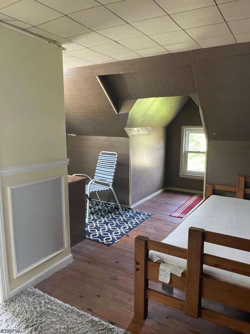 355 Metlars Lane Piscataway, NJ 08854 - Photo 8 of 26 a bedroom with a bed and window