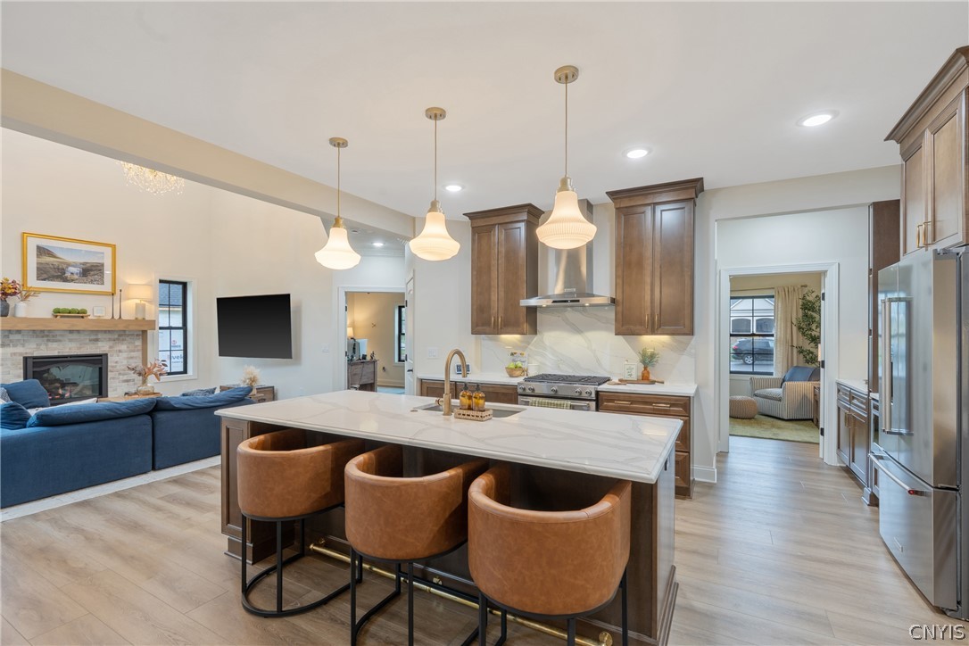 2020 Rubicon Road Lysander, NY 13027 - Photo 17 of 49 Exquisite luxury vinyl tile flooring, showcasing the refined beauty with exceptional durability and timeless sophistication.