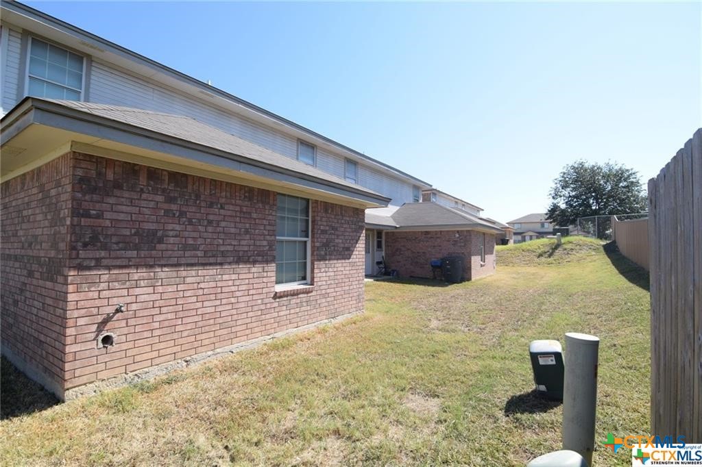 4002 Doraine Court, Unit D Killeen, TX 76549 - Photo 16 of 18 a view of house with backyard