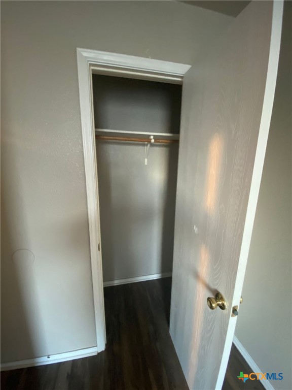 4002 Doraine Court, Unit D Killeen, TX 76549 - Photo 10 of 18 an empty room with wooden floor