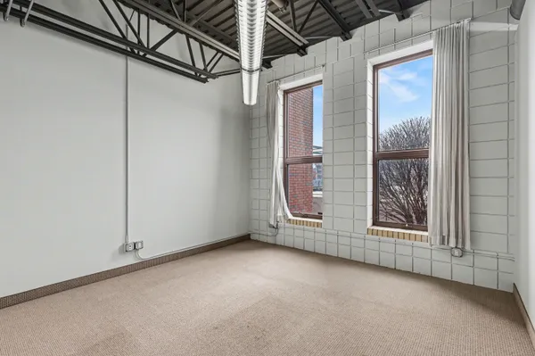 $395,000 | 801 Monroe Avenue Northwest, Unit 105, Grand Rapids, MI 49503