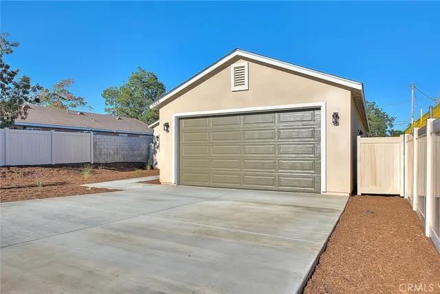 a front view of a house with a garage