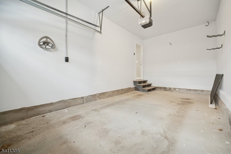 134 Hillside Avenue Livingston, NJ 07039 - Photo 19 of 25 a view of a room with racks on the wall