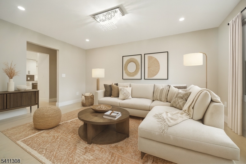 134 Hillside Avenue Livingston, NJ 07039 - Photo 3 of 25 a living room with furniture and view of bathroom