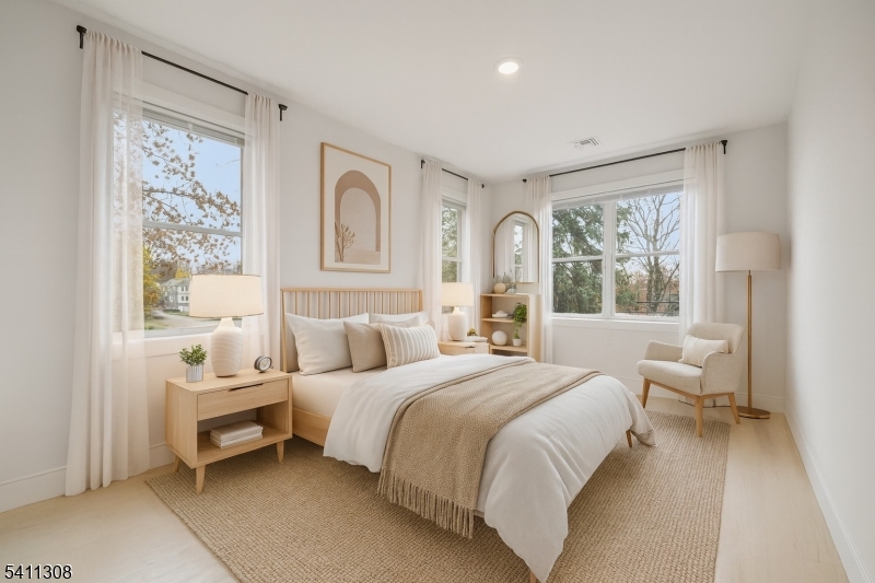 134 Hillside Avenue Livingston, NJ 07039 - Photo 10 of 25 a bedroom with bed and a large window