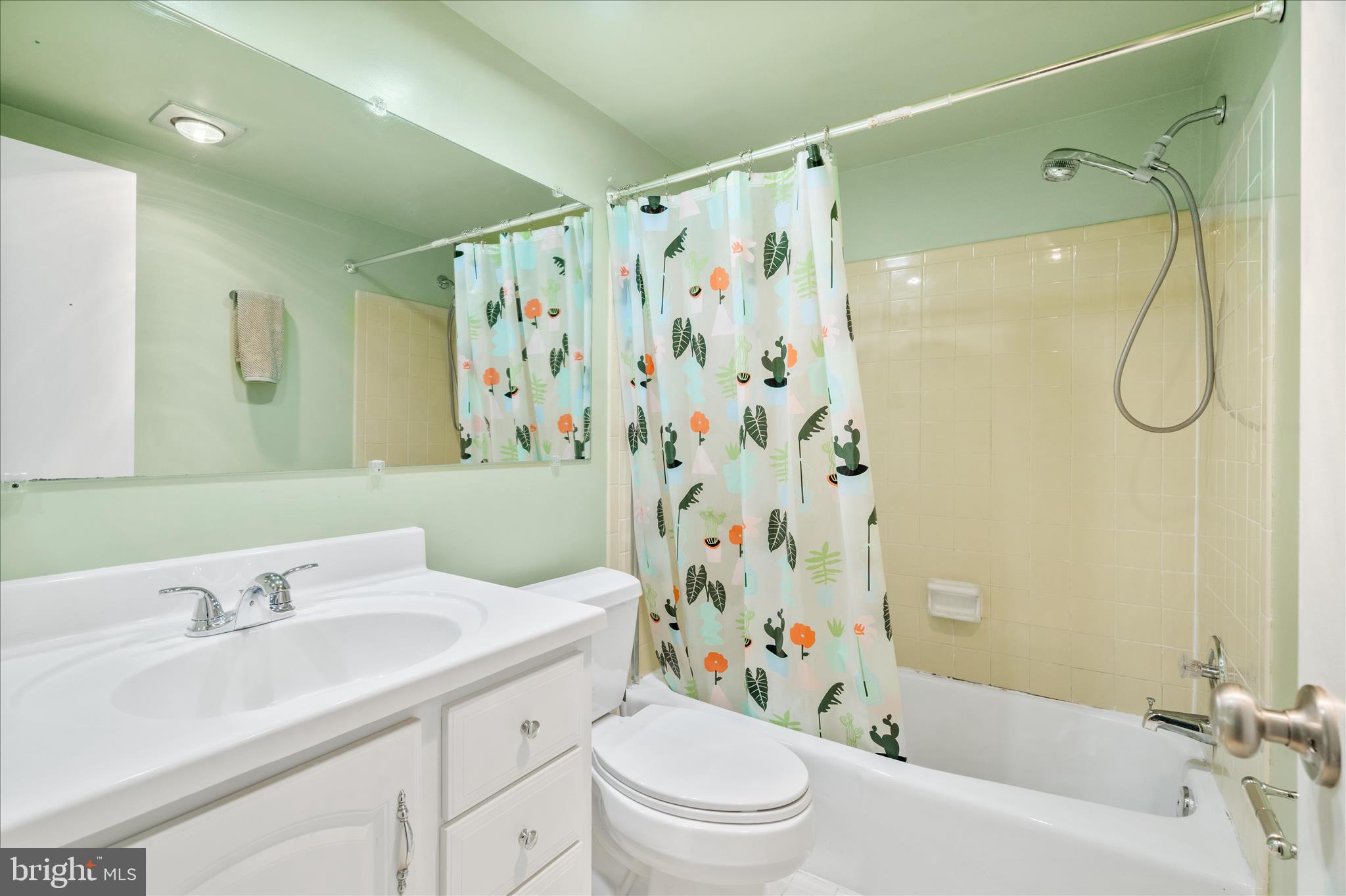 10000 Stedwick Road, Unit 104 Montgomery Village, MD 20886 - Photo 20 of 31 a bathroom with a sink toilet tub and shower