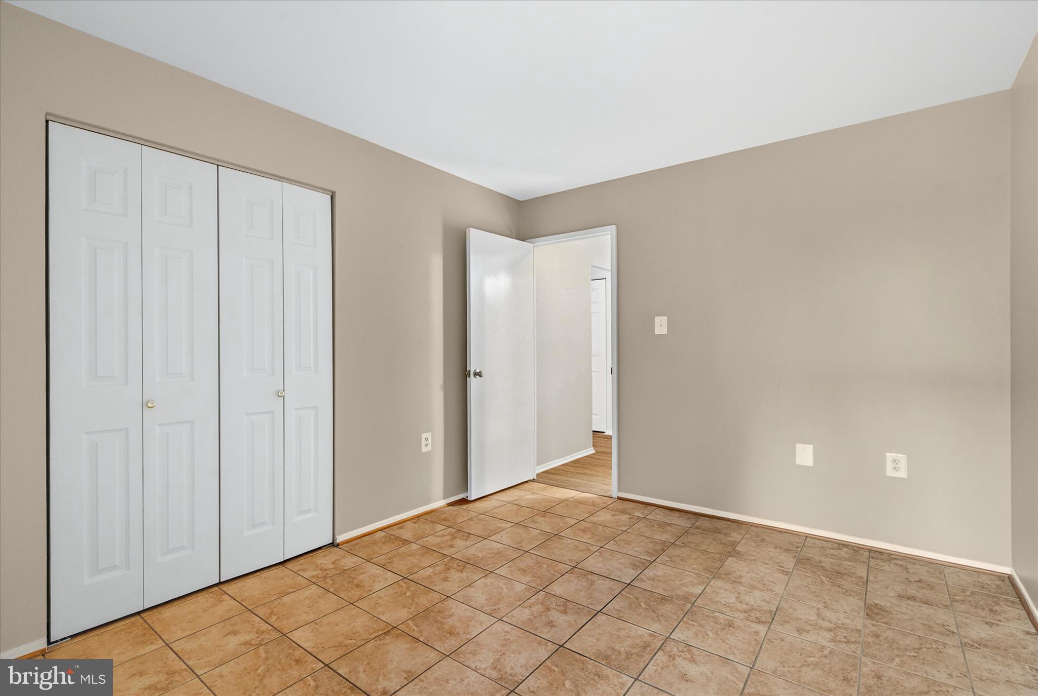 10000 Stedwick Road, Unit 104 Montgomery Village, MD 20886 - Photo 23 of 31 a view of an empty room