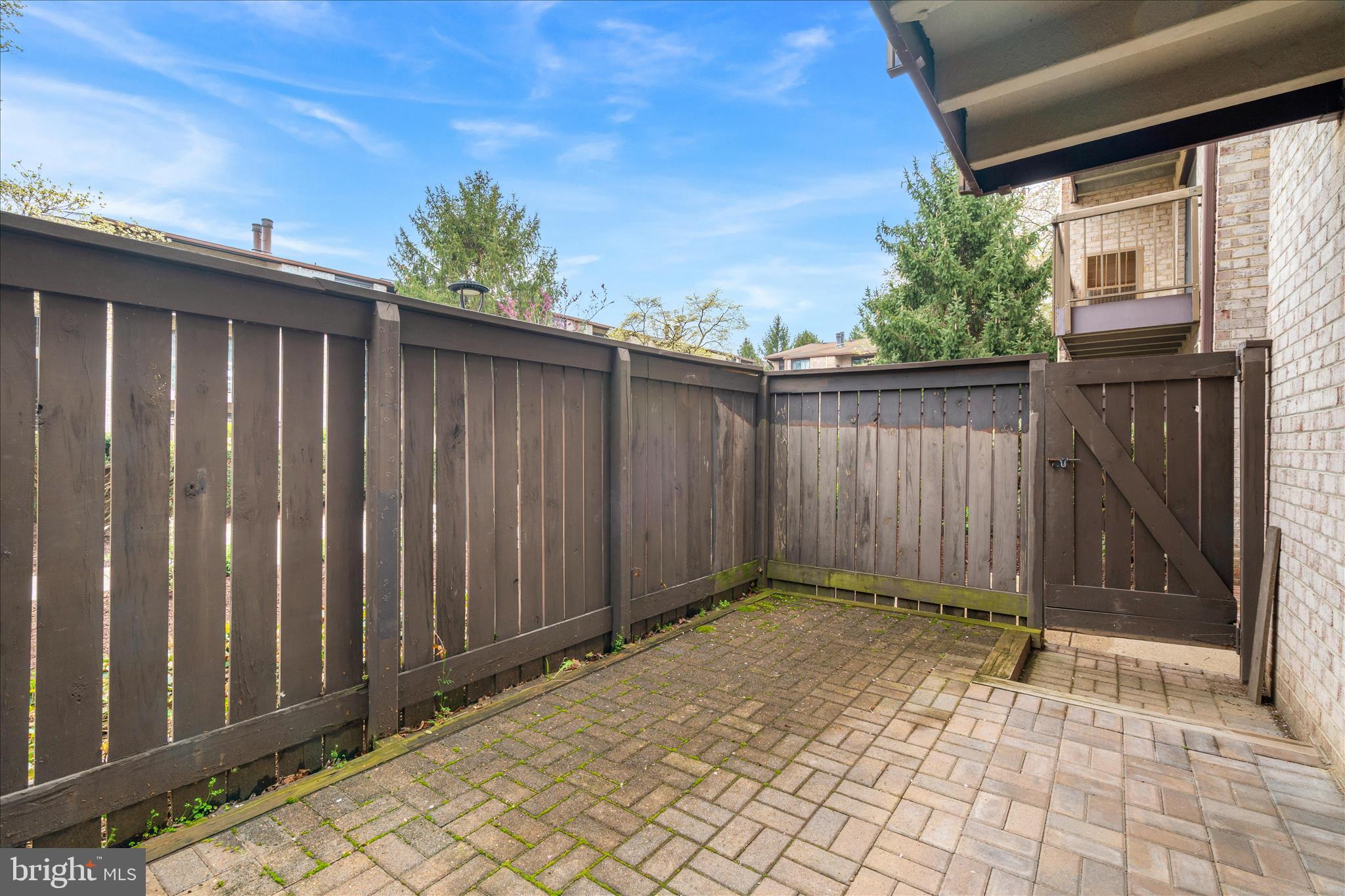 10000 Stedwick Road, Unit 104 Montgomery Village, MD 20886 - Photo 26 of 31 a view of backyard with tub