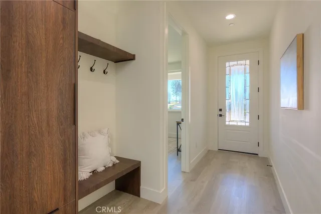 a kitchen with a table and chairs in it