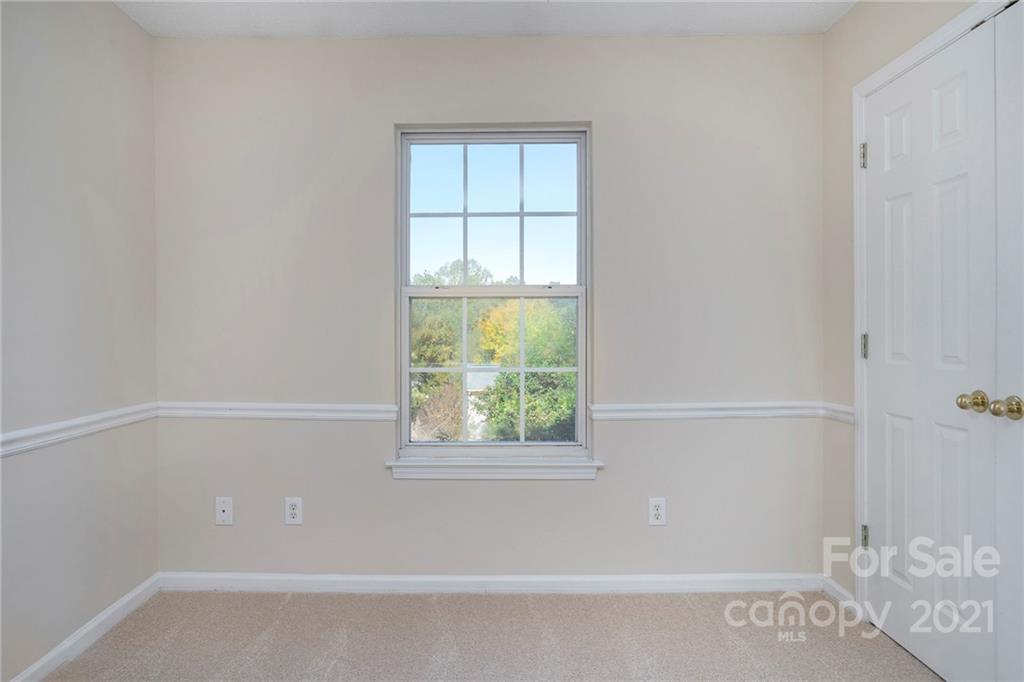 5532 Lemley Road Northwest Concord, NC 28027 - Photo 11 of 18 a view of an empty room with a window