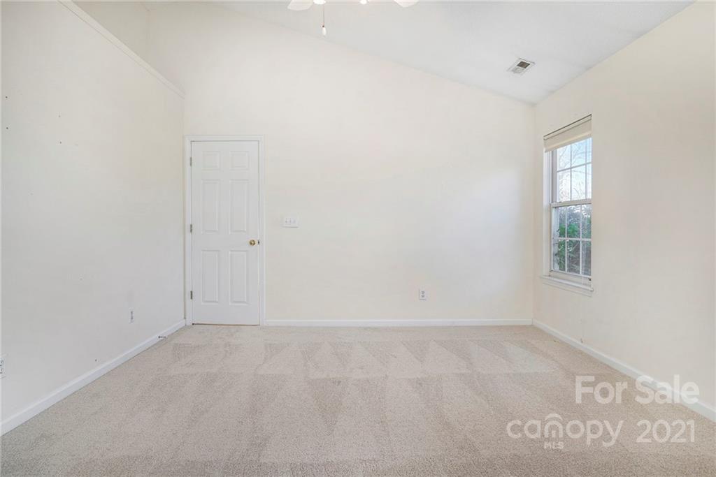 5532 Lemley Road Northwest Concord, NC 28027 - Photo 7 of 18 an empty room with windows