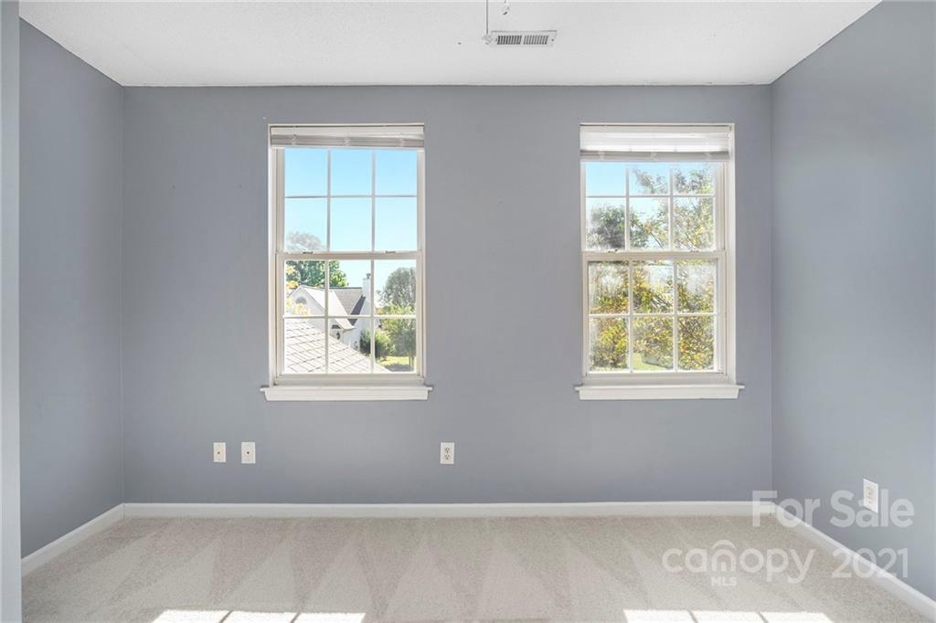 5532 Lemley Road Northwest Concord, NC 28027 - Photo 10 of 18 an empty room with a window