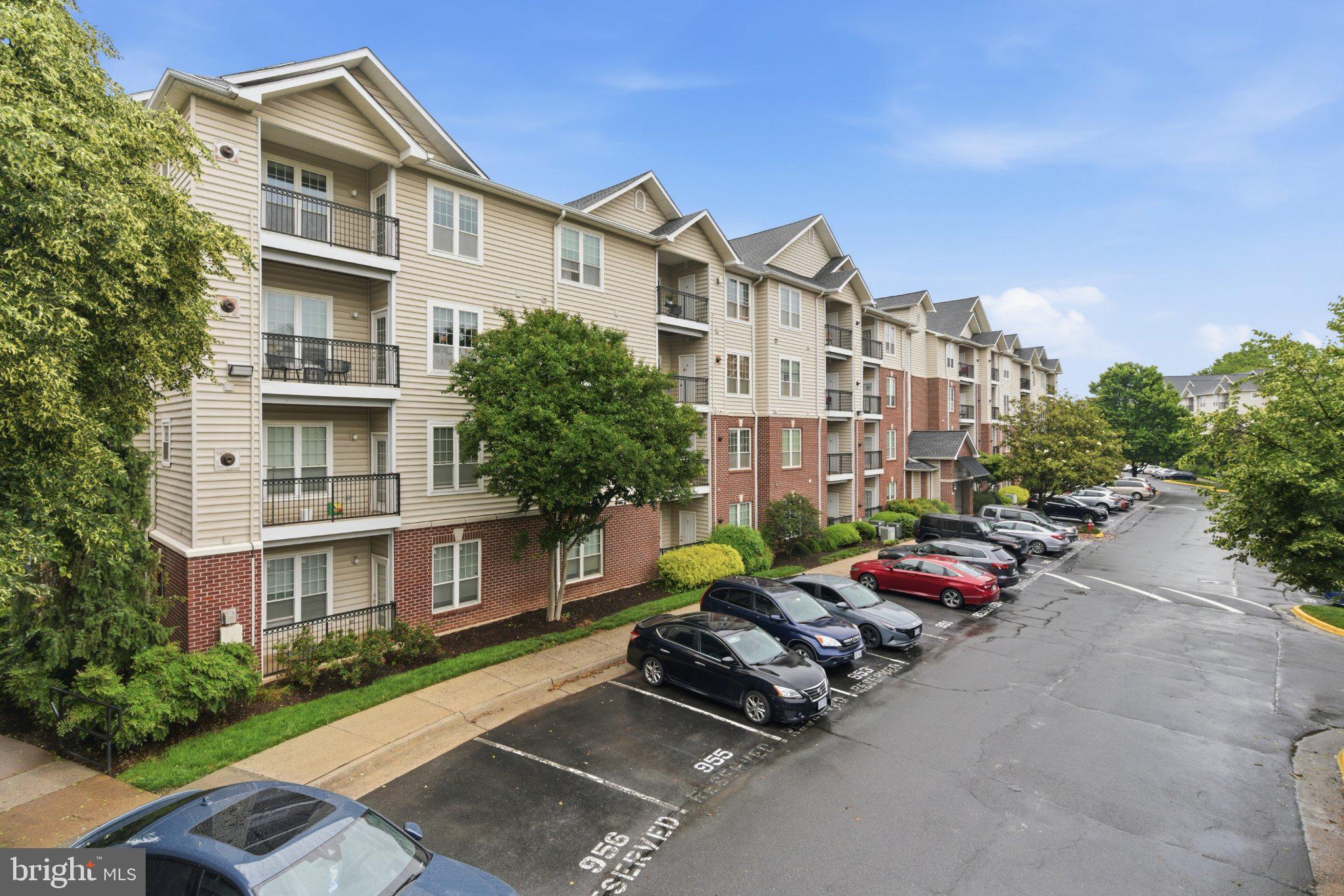 1580 Spring Gate Dr., Unit 4303 McLean, VA 22102 - Photo 36 of 41 Charming apartments with lush greenery.