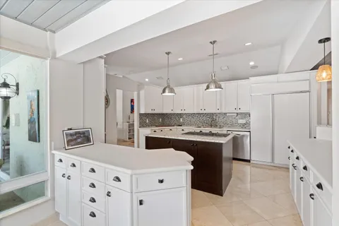 $3,925,000 | 830 Northeast Boca Bay Colony Drive, Boca Raton, FL 33487