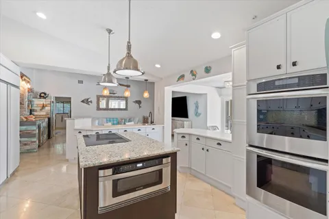 $3,925,000 | 830 Northeast Boca Bay Colony Drive, Boca Raton, FL 33487