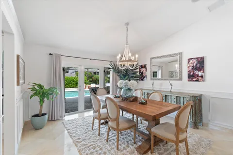 $3,925,000 | 830 Northeast Boca Bay Colony Drive, Boca Raton, FL 33487