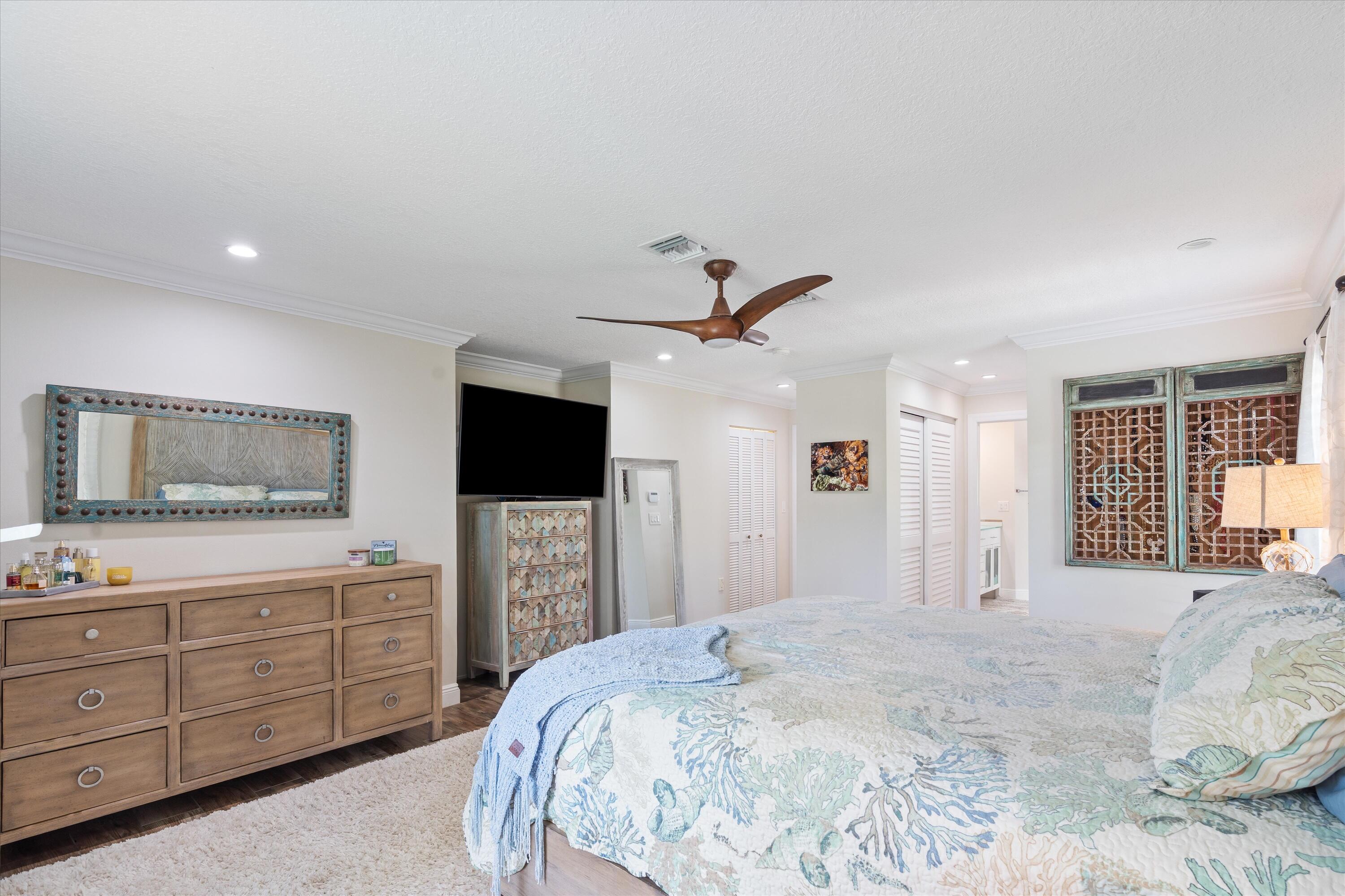 830 Northeast Boca Bay Colony Drive Boca Raton, FL 33487 - Photo 27 of 52 Primary Bedroom