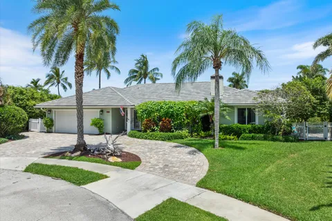 $3,925,000 | 830 Northeast Boca Bay Colony Drive, Boca Raton, FL 33487