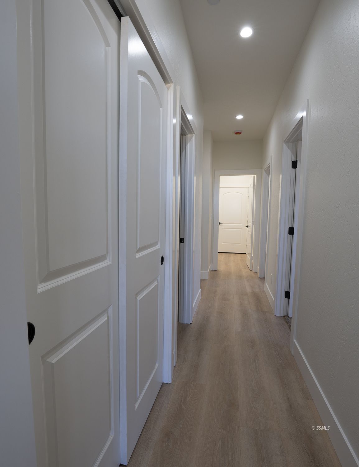 1528 Mayo Street Ridgecrest, CA 93555 - Photo 17 of 34 a view of hallway with wooden floor