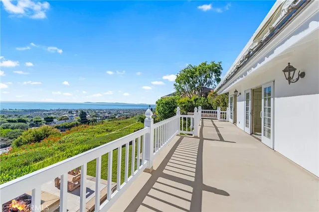 a view of a balcony with an outdoor space