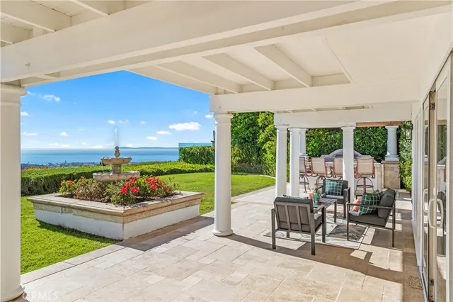 a view of a garden with a lounge chair