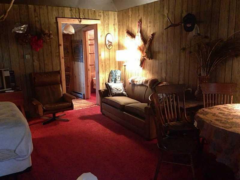 301 East Cottage Road Portage, ME 04768 - Photo 4 of 7 Living Room.